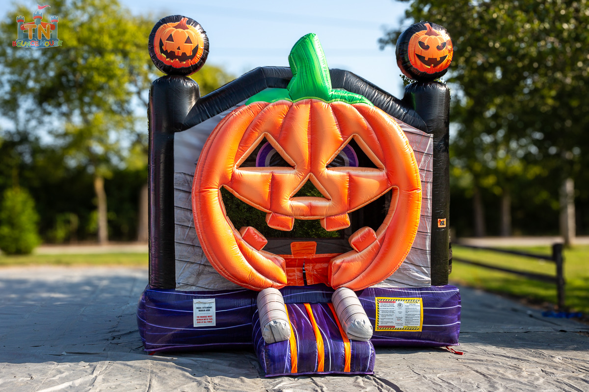 3D Pumpkin Halloween bounce house rental set up for a fall festival in Middle Tennessee